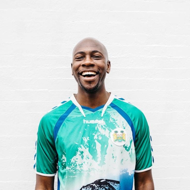 Asha Rao, Lead Design Curator at ParcelGardenHub, reviewing corporate floral arrangements